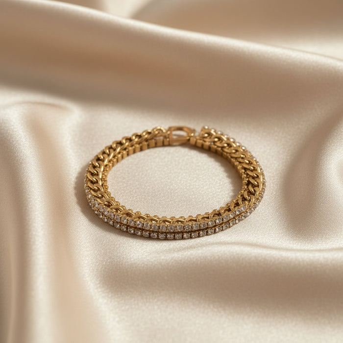 Altin Noor gold-tone multi-layered chain bracelet featuring beaded and curb chains with clear crystal accents.