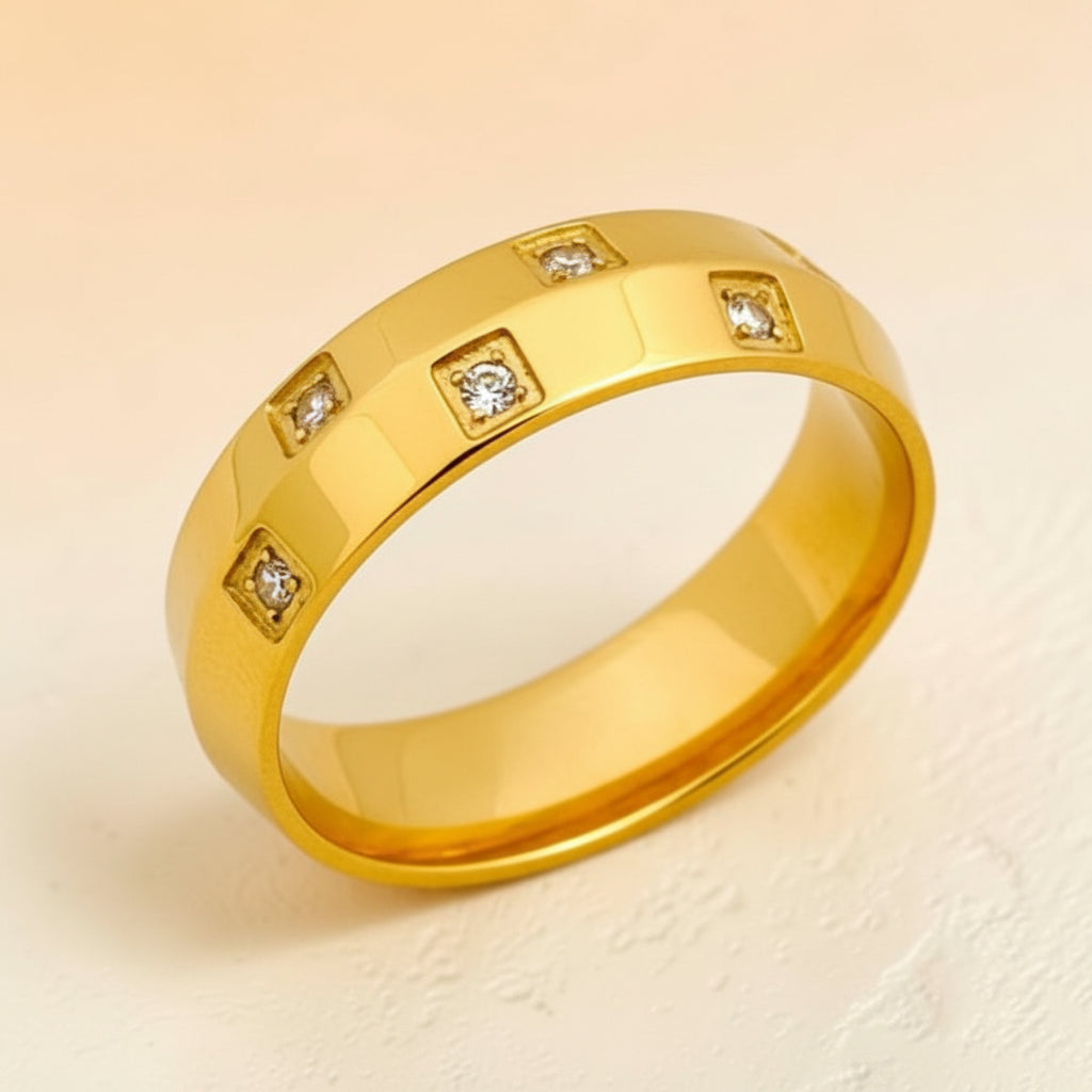Altin Noor gold plated band ring featuring square-set cubic zirconia stones in a polished minimalist design.